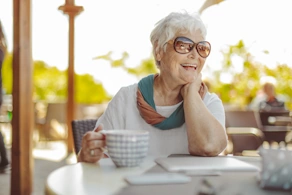 Life Assure Senior Enjoying Coffee On Vacation Blog